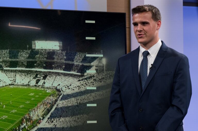 Joseph Draper reports from the studio set with Beaver Stadium on screen at Penn State